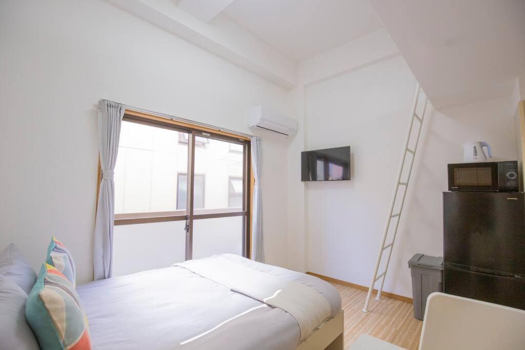 閑静な住宅街_暖かく居心地の良いデザイン Eos-J Tokio Exterior foto